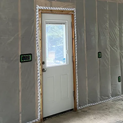 Roxul batts covered with 6mil poly and seams taped