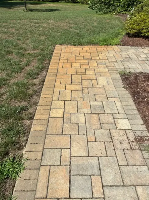 Before Irrigation Rust Stain Removal from a Paver Walkway in Worcester County, MA — Pro Pressure Washing
