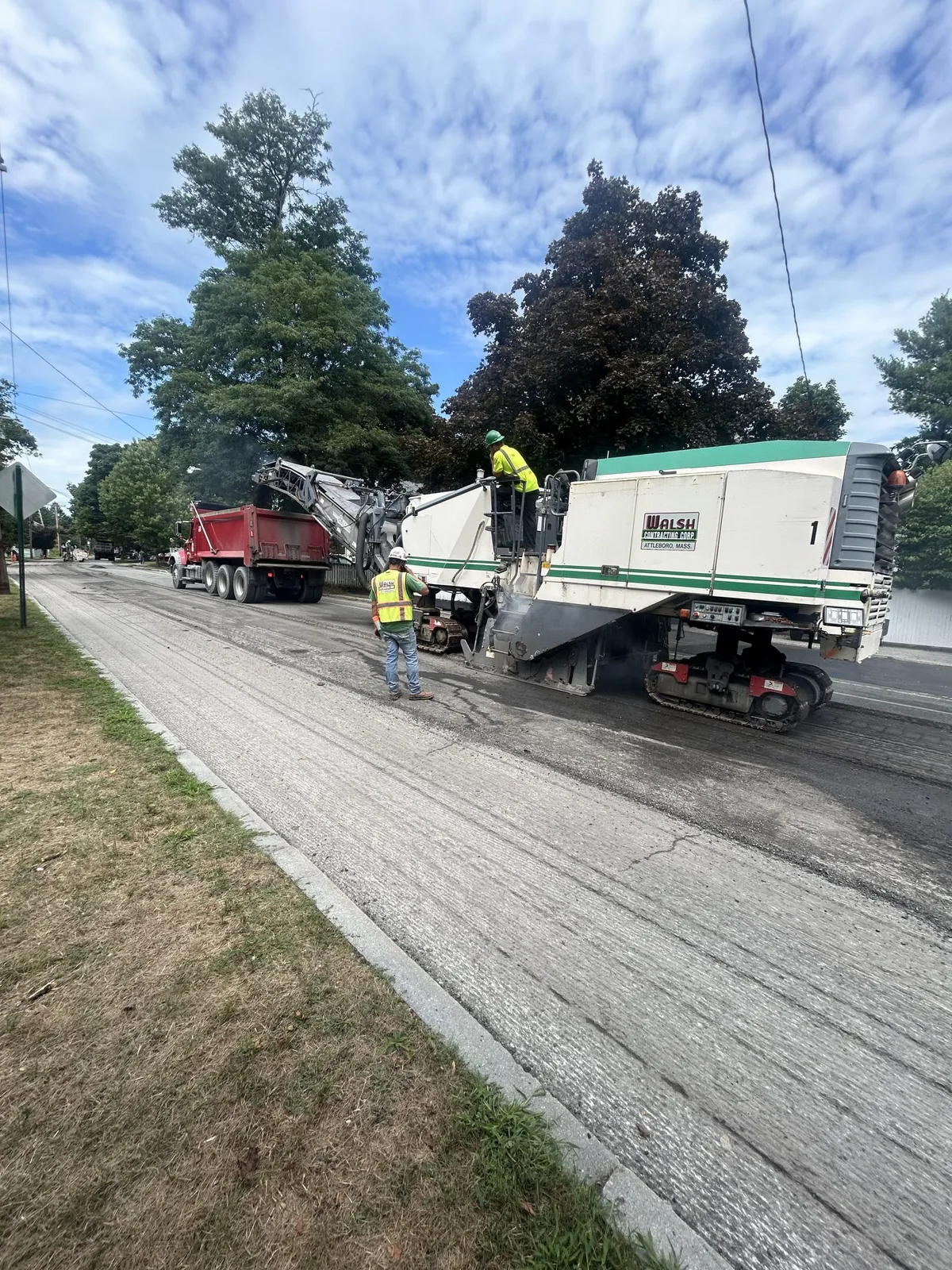 Road milling operations by Walsh Contracting Corp, restoring the asphalt surface in preparation for high-quality pavement installation.
