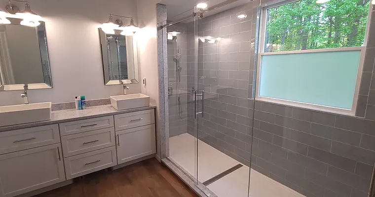 Full master bathroom, custom tile install, oversized heated shower, large shower doors. Custom sinks and vanities