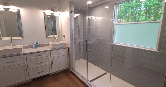 Full master bathroom, custom tile install, oversized heated shower, large shower doors. Custom sinks and vanities