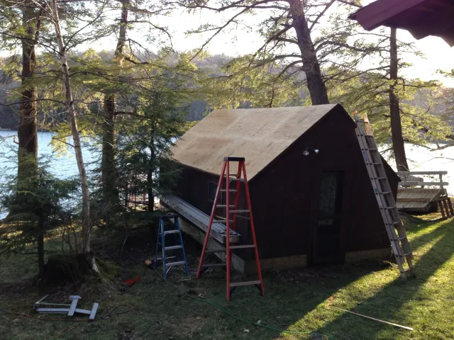 Plywood Sheathing Installed On Boat House Roof (During)