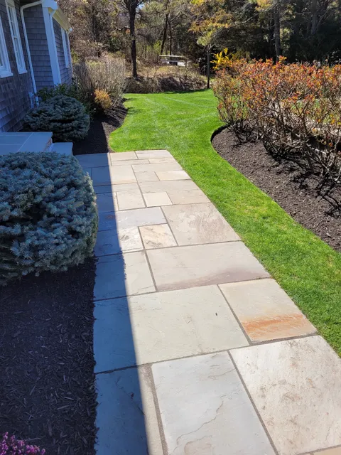 Stick landscaping and fall cleanup work photo