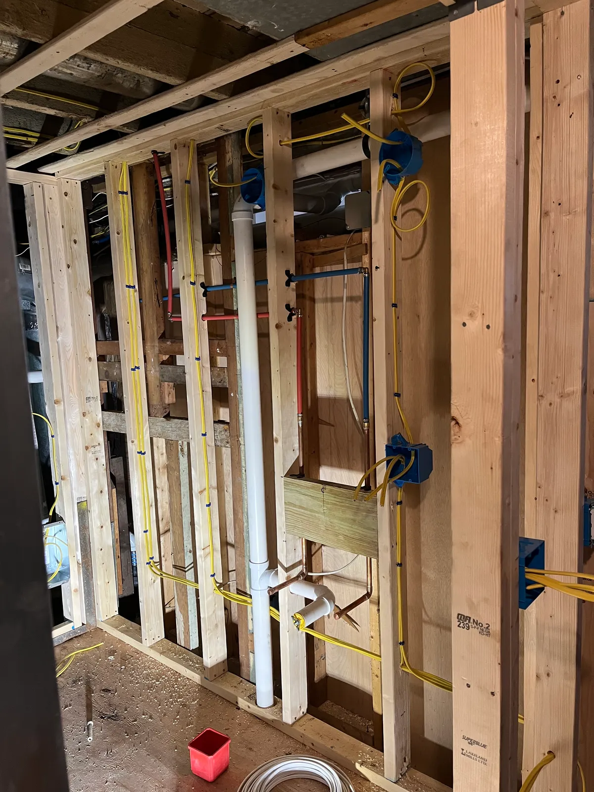 Wiring run through open ceiling joists