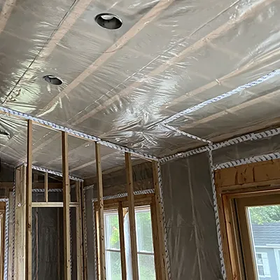 Pro Insulators view 3 installed Roxul insulation with 6 mil poly and seams taped
