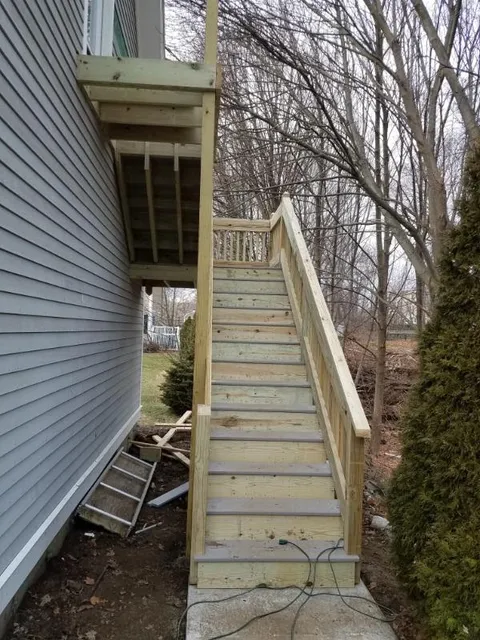New pressure-treated exterior stairs and landing
