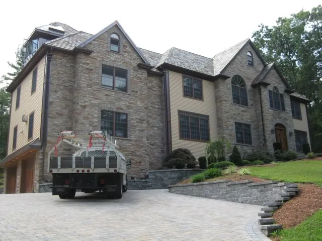 Duval truck at a completed slate roof project