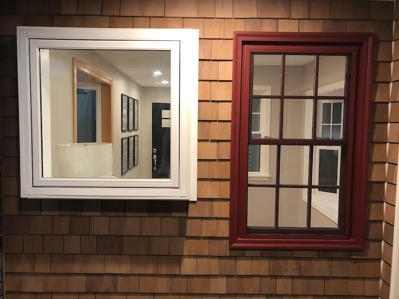 Showroom window display on cedar shake siding