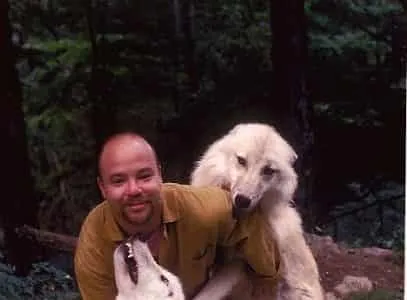 Brian Sweig with wolves