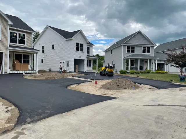 New asphalt driveway at a Portland Maine home