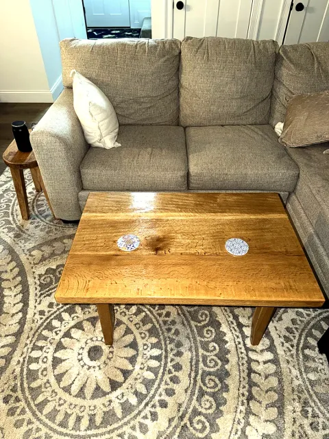 Custom built wooden coffee table styled in a living room