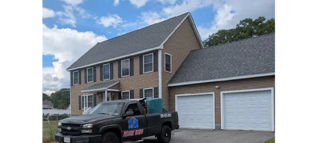 Max Pressure Washing truck in front of clean house
