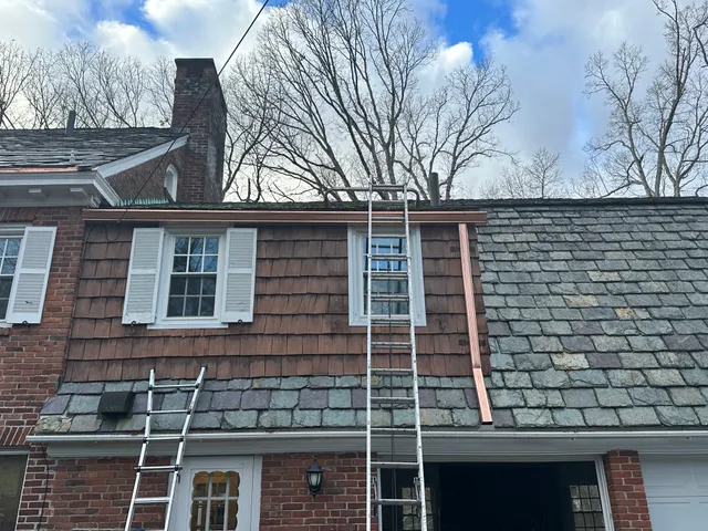 Slate Roof Repair LLC work photo