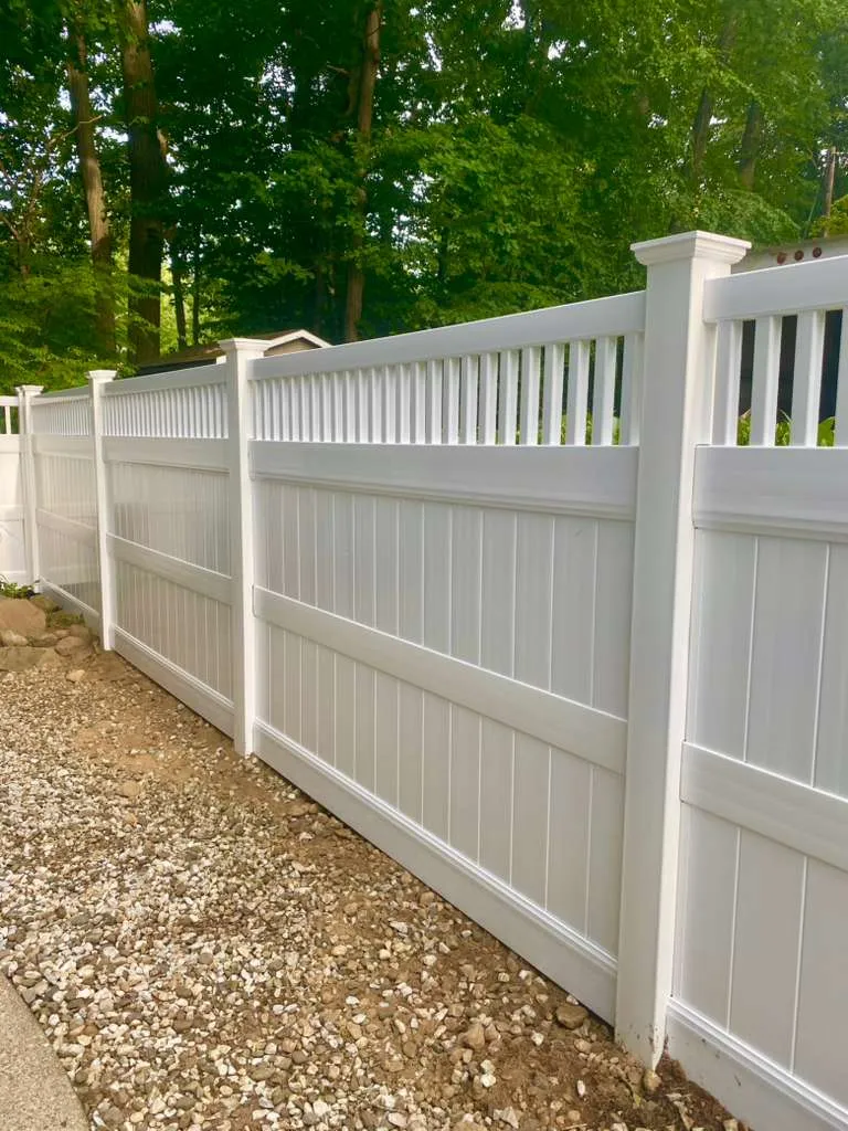 White privacy fence pathway