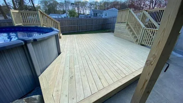 Custom pool and patio deck, pool entrance stairs and deck stairs connected to the house, made from natural wood