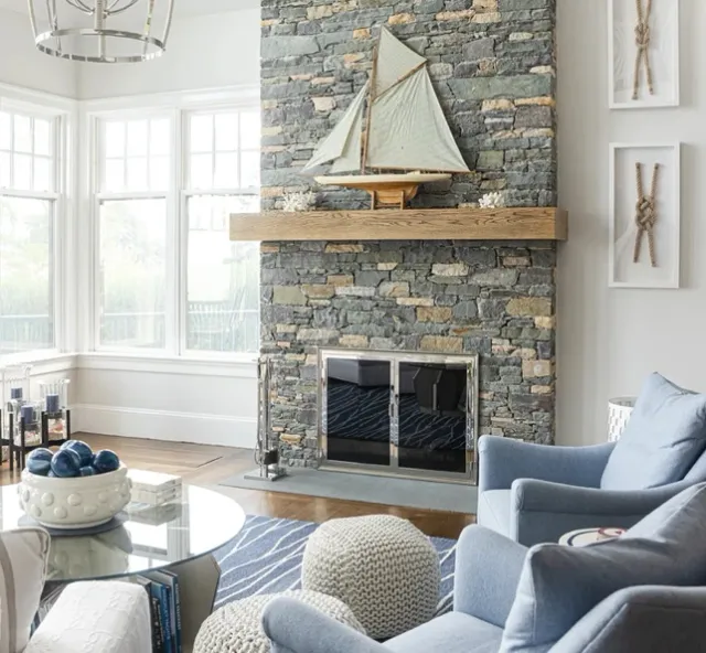 Coastal living room with stone fireplace
