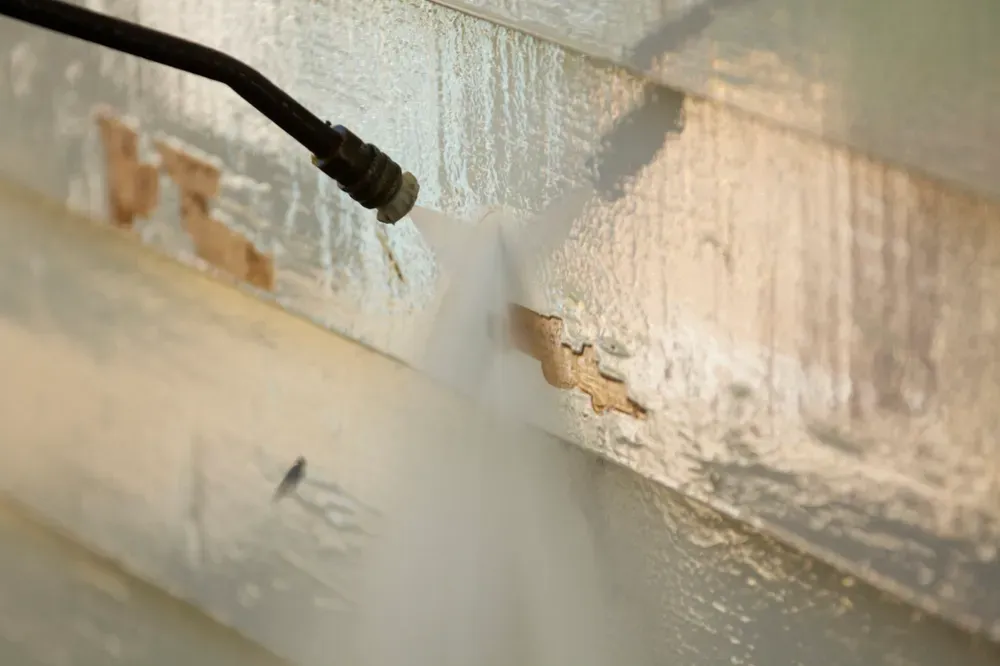 Revitalize your home's exterior with our professional power washer service, effectively removing dirt and grime. Our skilled team ensures a spotless finish that enhances curb appeal for your residential property. for MGR Painting & Cleaning in Everett, MA