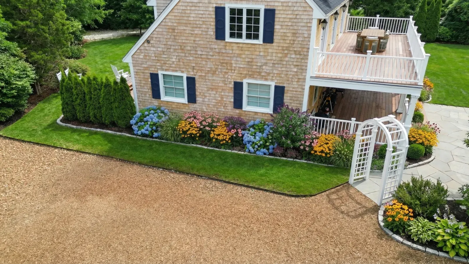Finished front garden bed with layered planting