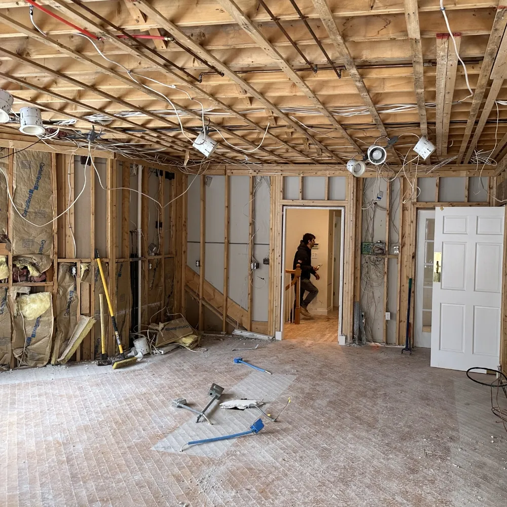 An interior room that is being demolished.