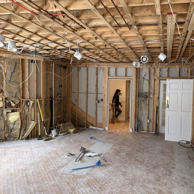 An interior room that is being demolished.