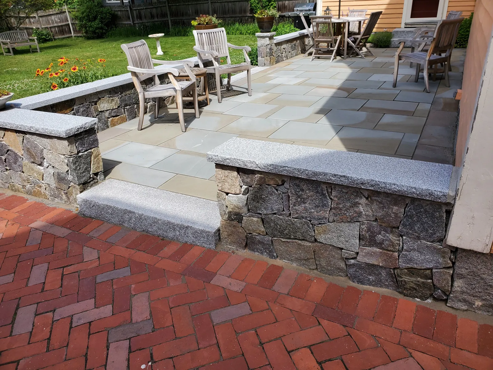 Custom stone patio built by Stiles and Sons in NH Seacoast