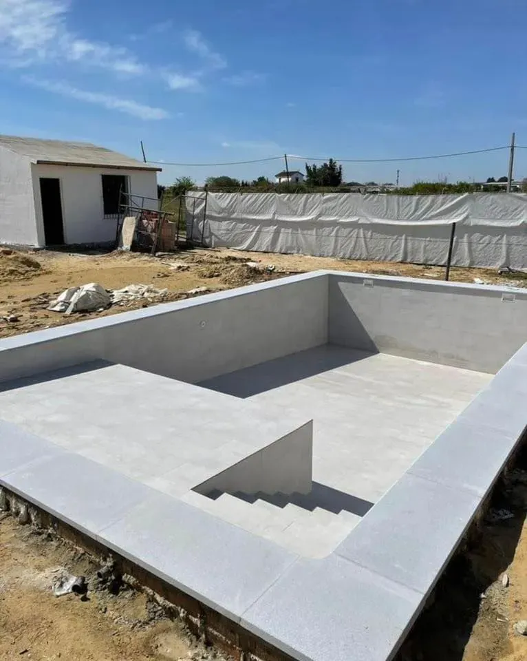 Transform your backyard with our custom inground pool installation services; combining expert design and craftsmanship to create a stunning oasis that enhances your outdoor living space and adds value to your home. for S&G Hardscaping and Plowing in Boston, MA