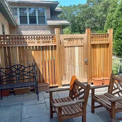 a wood fence with a gate
