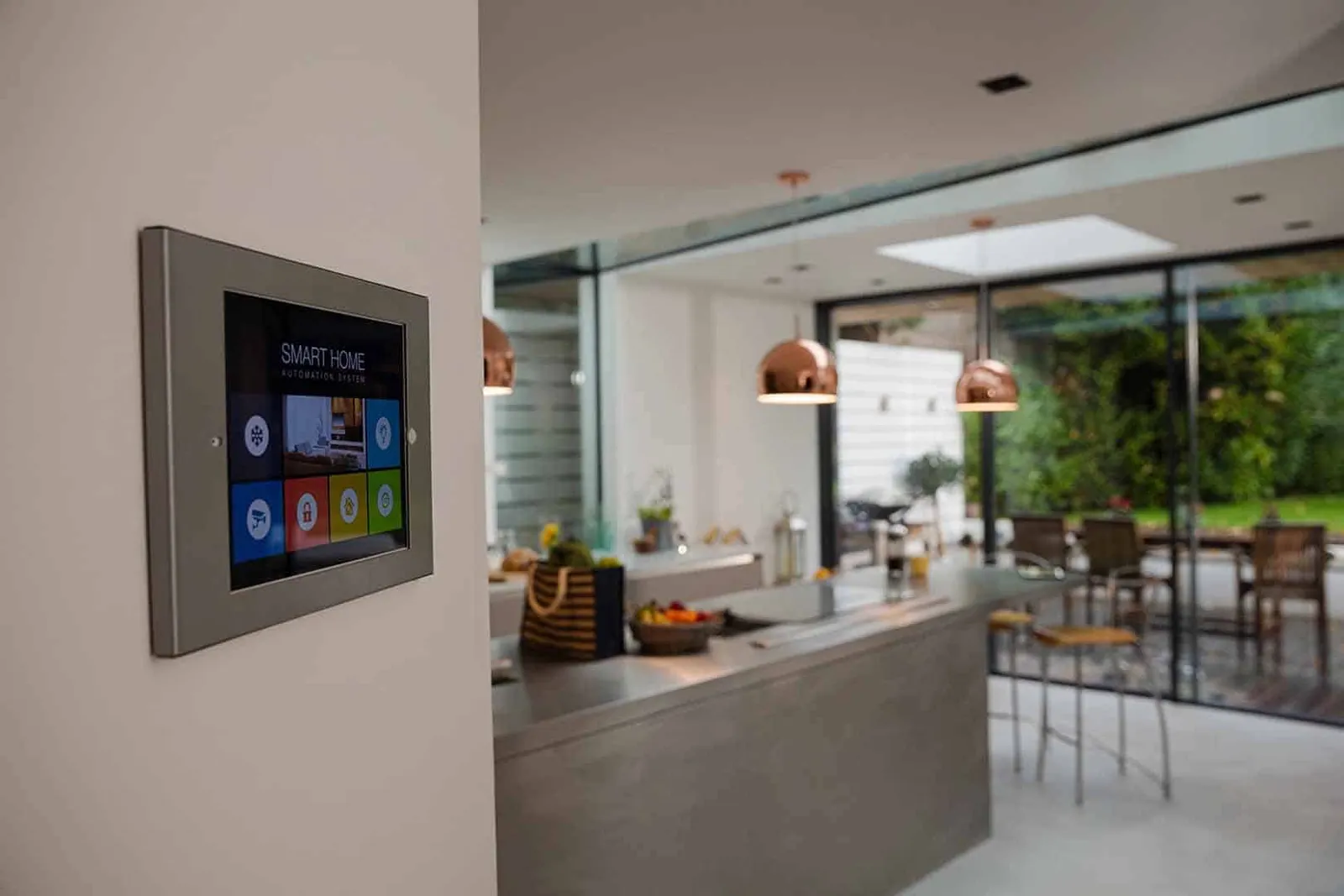 Smart home automation hub located near a kitchen in a home.