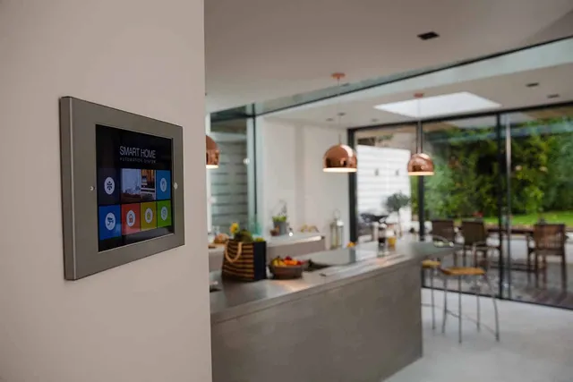 Smart home automation hub located near a kitchen in a home.