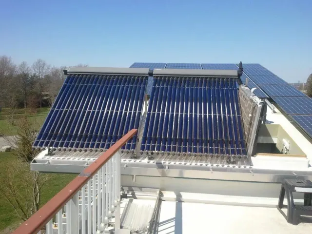 A roof with a lot of solar panels on it