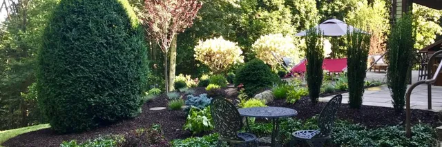 hillside patio seating with plantings