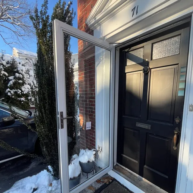 New storm door over a replacement entry door