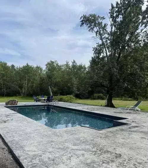 outdoor pool with trees