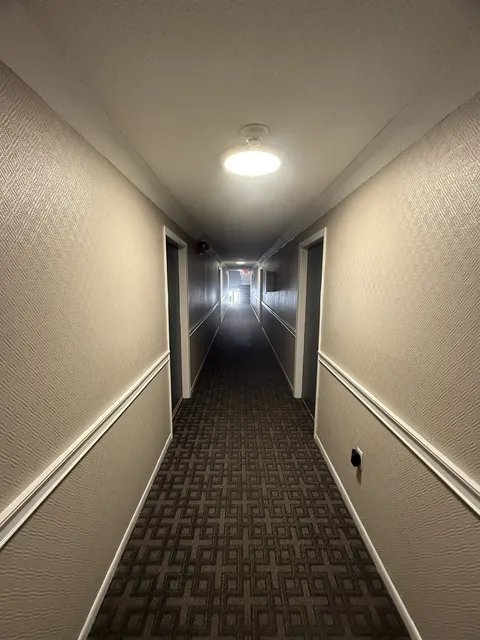 Apartment building corridor — after