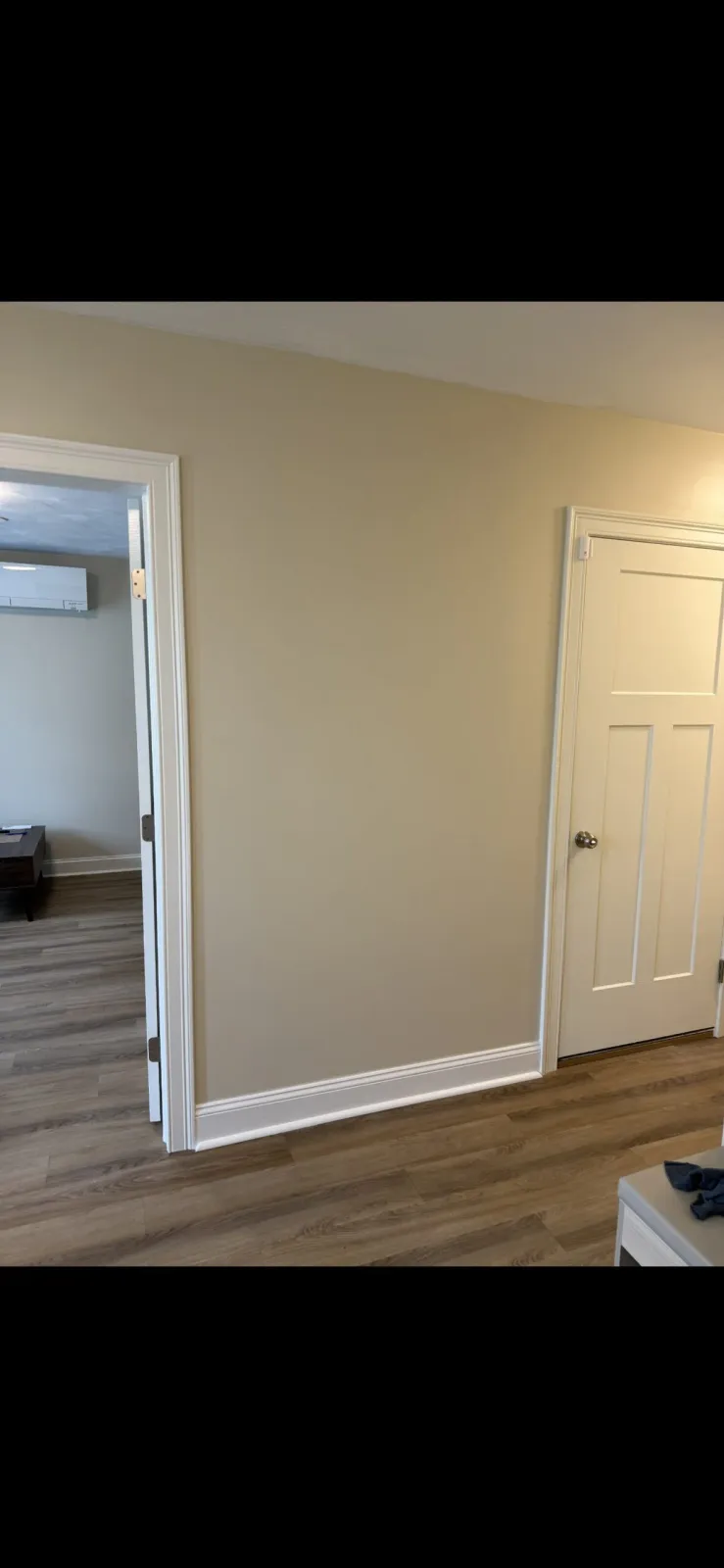 Finished guest bedroom doorway with matching trim in Wilmington Massachusetts