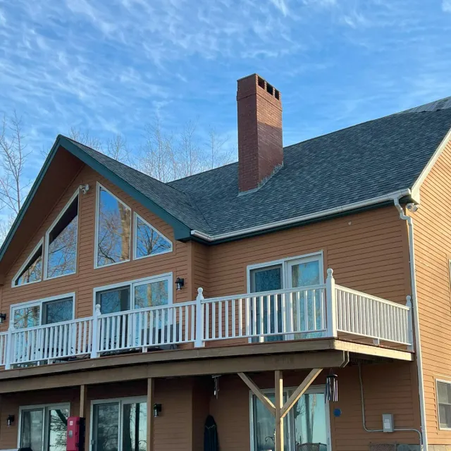 asphalt roof on a brown house