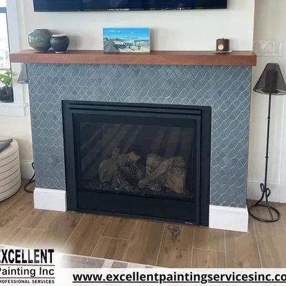 A fireplace in a living room with a tv above it