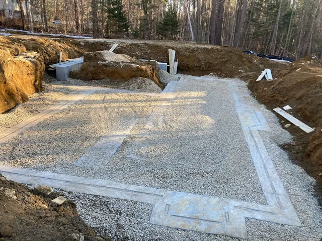 A construction site with a lot of dirt and gravel.