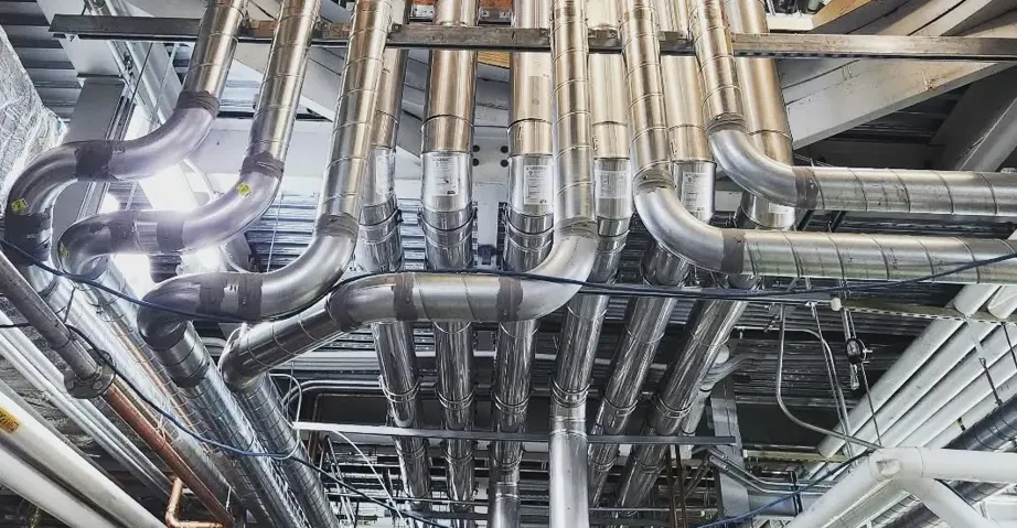 Ventilation Exhaust Duct In The Ceiling Of The Factory