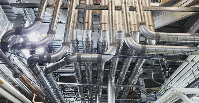 Ventilation Exhaust Duct In The Ceiling Of The Factory