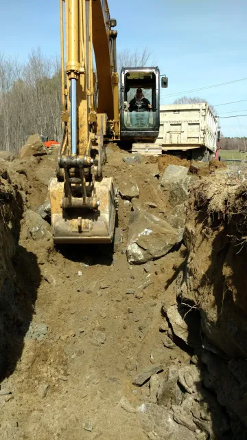 Excavating to replace a septic system in Belchertown, MA