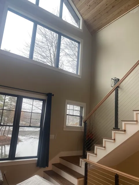 Expertly painted kitchen cabinets and detailed trim work showing a smooth, professional finish.