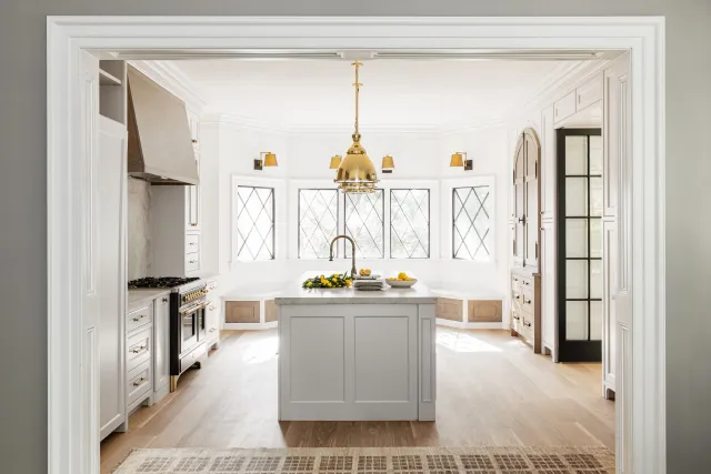 Finished kitchen with island and gold accents
