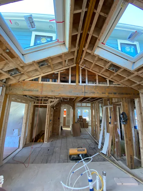 Roof framing and new skylight openings during a renovation