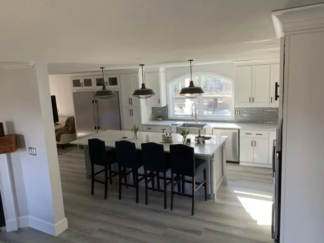 Bright white kitchen remodeled by Pereira Construction
