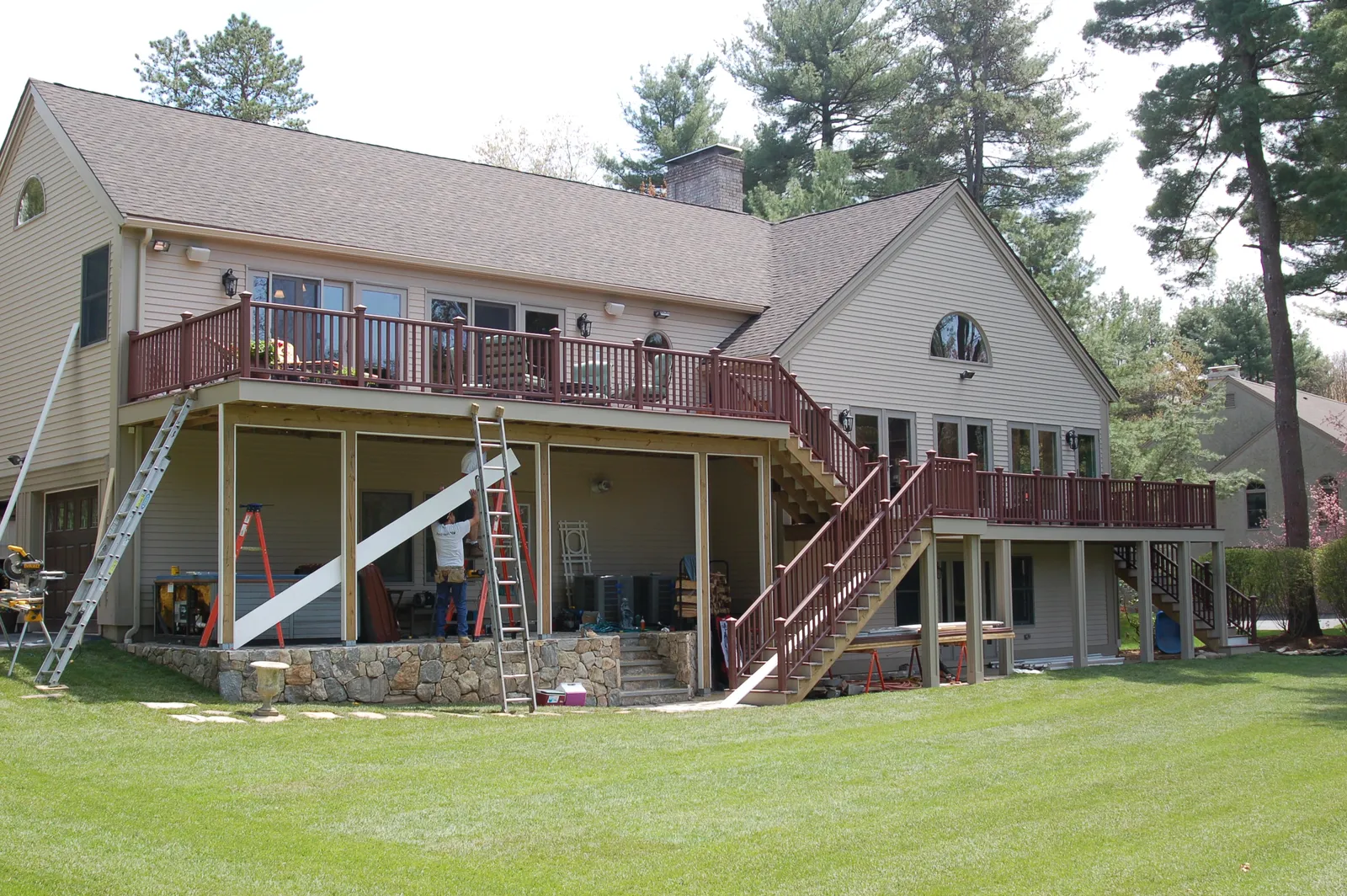 Deck and lower-level addition under construction