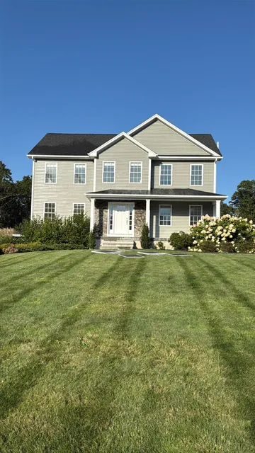 Clean Rhode Island home exterior after Sunset Pressure Washing