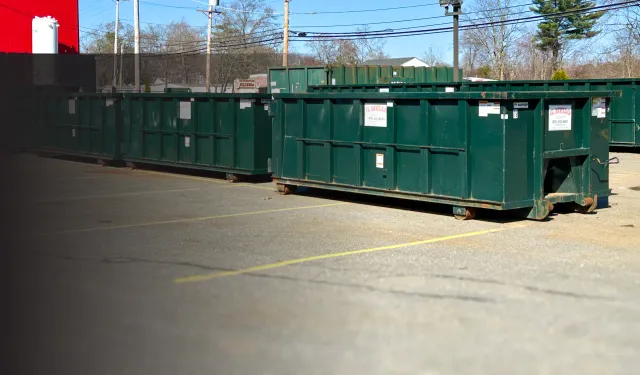 Row of G. Mello roll-off containers