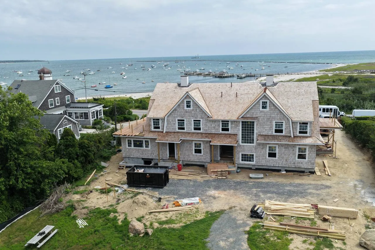 Harbor and Nantucket Sound view behind the cedar rooflines