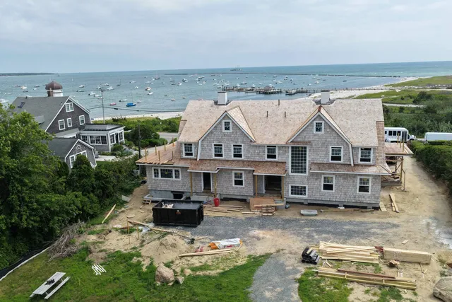 Harbor and Nantucket Sound view behind the cedar rooflines